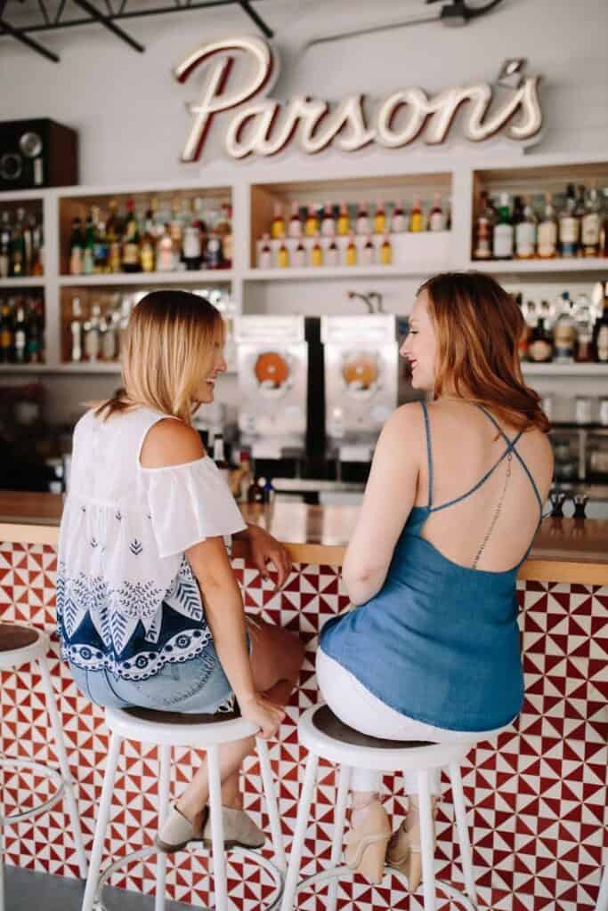 Confident high-achieving women entrepreneurs over 50 in a business meeting showing leadership